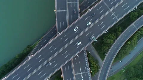 Aerial drone view of highway multi-level junction road with moving cars at Stock Footage 152974091