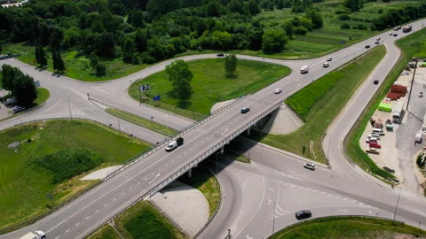 Aerial drone view of highway multi-level junction road with moving cars. The Stock Footage 155687716