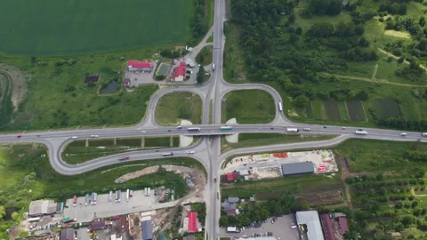 Aerial drone view of highway multi-level junction road with moving cars near to Stock Footage 155755890
