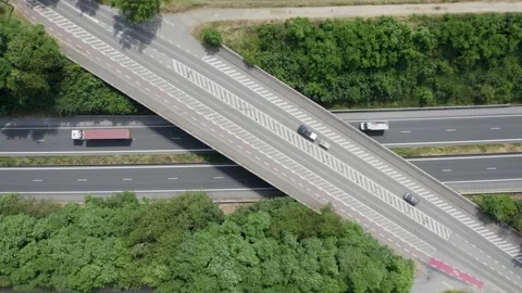 Aerial drone view of highway multi-level junction road with moving cars. Active Stock Footage 248684740