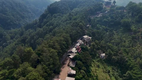 Aerial Drone View of Hills, Forest and Cliffside Buildings in Dago Pakar Bandung 库存影片 342418471