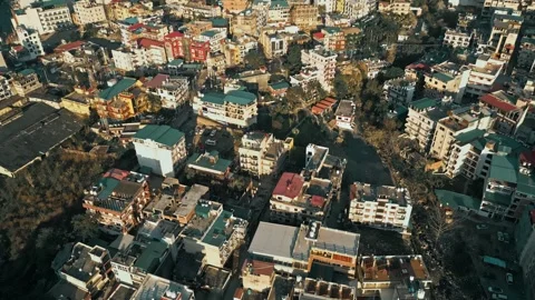 Aerial drone view of hillside town with dense houses and buildings Stock Footage 343864755