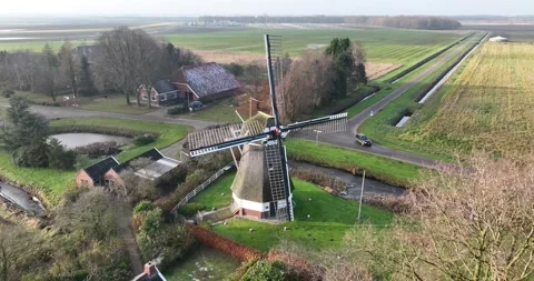 Aerial drone view on a historic wind mill, cultural heritage. Groningen , The 動画素材 257614573