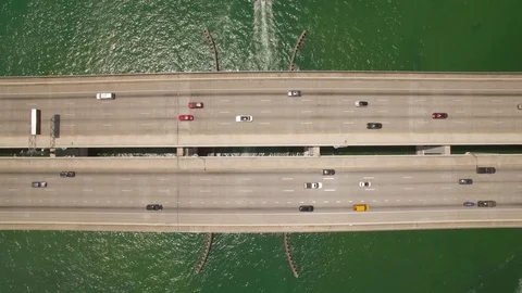 Aerial drone view of I-195 highway bay bridge with cars and traffic Stock Footage 100856995