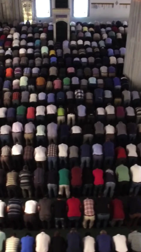 Aerial Drone View Inside Grand Mosque During Prayer Vertical Video Stockbeeldmateriaal 334884811