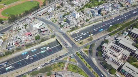 Aerial drone view of an intersection of an avenue with a fast track 스톡 동영상 150667552