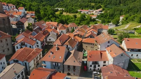 Aerial Drone View of Isaba, Spain, San Cipriano Church, Stone Houses, Pyrenees Stock Footage 300805822