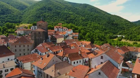 Aerial Drone View of Isaba, Spain, San Cipriano Church, Stone Houses, Pyrenees Stock Footage 300805871
