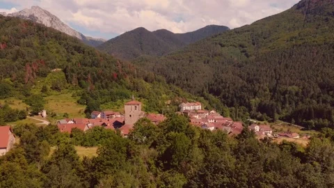Aerial Drone View of Isaba, Spain, San Cipriano Church, Stone Houses, Pyrenees Stock Footage 300805979