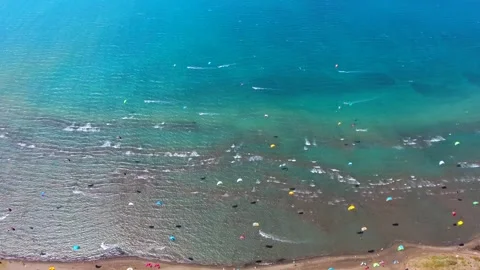 Aerial drone view of kiteboarders in Akyaka Gokova - Active Rider and Kite Surf Stock Footage 339800549