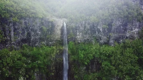Aerial drone view of "Lagoa do Vento" waterfall in "Paul da Serra", Madeira Stock Footage 122816538