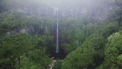 Aerial drone view of "Lagoa do Vento" waterfall in "Paul da Serra", Madeira Stock Footage 122816714