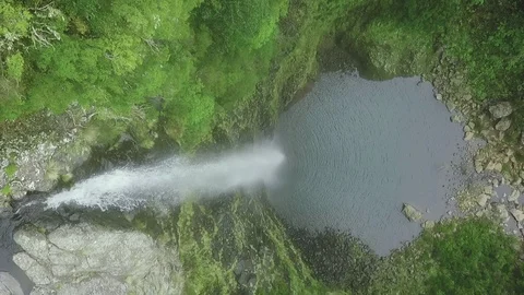 Aerial drone view of "Lagoa do Vento" waterfall in "Paul da Serra", Madeira Stock Footage 122817012