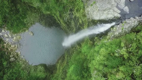 Aerial drone view of "Lagoa do Vento" waterfall in "Paul da Serra", Madeira Stock Footage 122817592