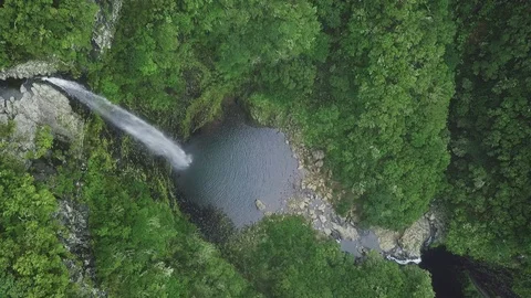 Aerial drone view of "Lagoa do Vento" waterfall in "Paul da Serra", Madeira Stock Footage 122817934