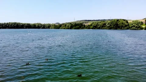 Aerial drone view of a lake in Normandy, France Stock Footage 290773897