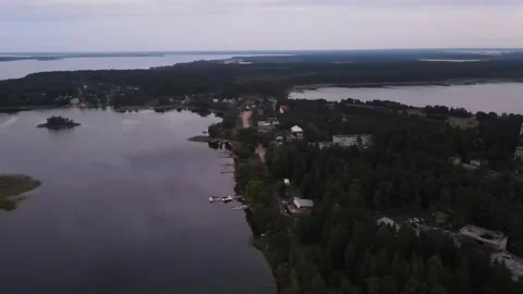 Aerial drone view of Lake Seliger shoreline and communications tower Stock Footage 338095771