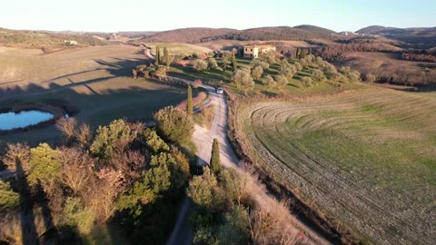 Aerial drone view landing path cypress trees Tuscany Italy Siena Stock Footage 168563367