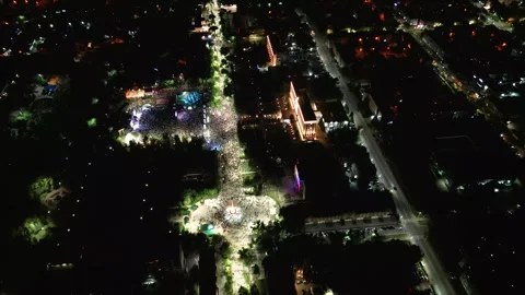 Aerial Drone View of a Large Crowd Dancing at an Outdoor Night Music Festival Stock Footage 340273239