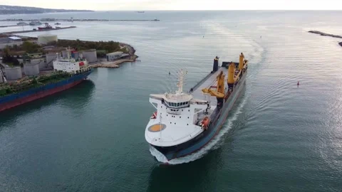 Aerial drone view of Large empty car cargo ship entering the port in Varna Stock Footage 219540555