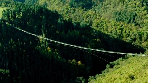 Aerial Drone View of a large hanging suspension bridge in  summer Vídeos de archivo 122377183