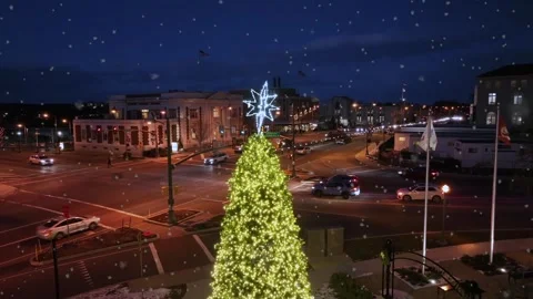 Aerial drone view of large illuminated Christmas tree in downtown Hershey Stock Footage 333397879