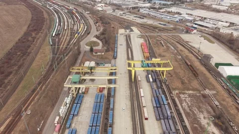 Aerial drone view of a large intermodal freight terminal with cargo containers Stock Footage 331612876