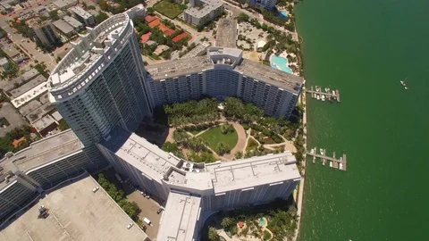 Aerial drone view of large luxury skyscraper condominium building in Miami Beach Stock Footage 100866017