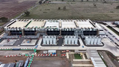 Aerial drone view of a large modern data center construction site Stock Footage 337810180