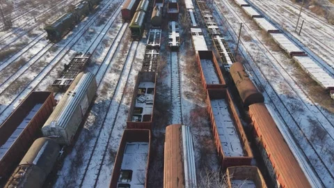 Aerial drone view of large rail yard on Iasi outskirts. Long rows of parked Stock-Footage 327404759