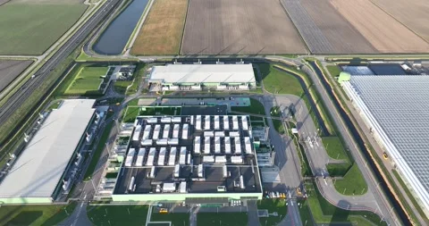 Aerial drone view of a large scale data center in Middenmeer, Hollands Kroon. Stock Footage 254858656