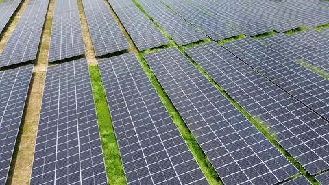 Aerial drone view of a large solar power farm producing clean electricity Stock Footage 306971225
