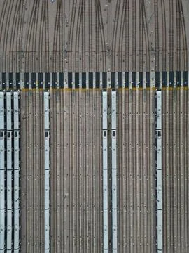 Aerial drone view of a large train depot and its tracks in London, England Stock Photos