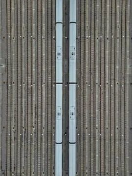 Aerial drone view of a large train depot and its tracks in London, England Stock Photos
