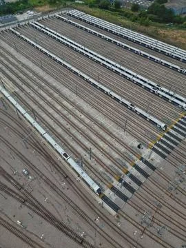 Aerial drone view of a large train depot and its tracks in London, England Stock Photos