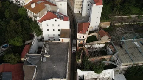Aerial drone view of Lavra funicular in Lisbon, Portugal Stock Footage 233641585