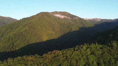 Aerial Drone View of Light and Shadow Over Snow-Capped Mountains, Georgia 4K Video stock 343328420