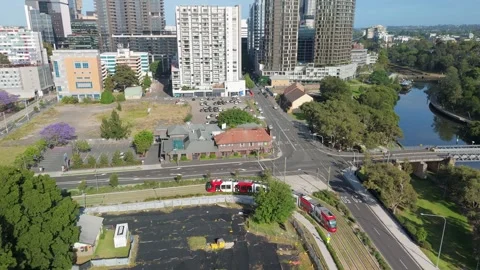 Aerial drone view of a light rail vehicle at Parramatta in Western Sydney, NSW Stock Footage 291517574