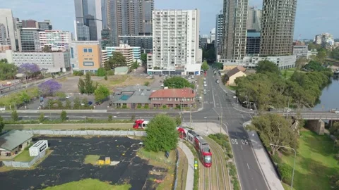 Aerial drone view of a light rail vehicle at Parramatta in Western Sydney, NSW Video stock 291527657