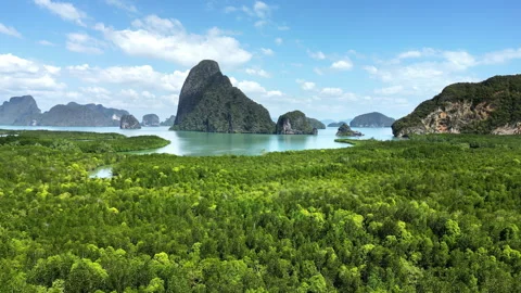 Aerial drone view of limestone karst islands rising from the sea in Phang Nga 스톡 동영상 330799674