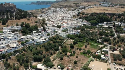 Aerial Drone View of Lindos Acropolis Ruins and White Village, Rhodes, Greece Stock Footage 343319016