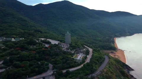 Aerial drone view of Linh Ung Pagoda and Da Nang coastline on cloudy day Stock Footage 340597513