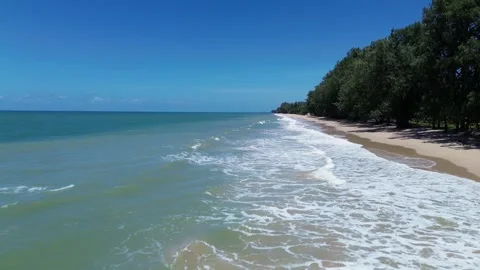 Aerial drone view of Long Beach in Koh Lanta Thailand with turquoise ocean and Stock Footage 317883671