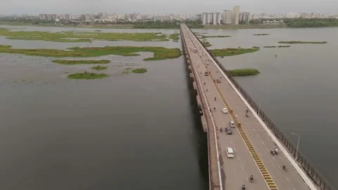Aerial Drone View of Long Bridge Crossing River Stock-Footage 338351477