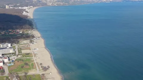 Aerial drone view of long sandy beach and blue sea Stock Footage 324529744