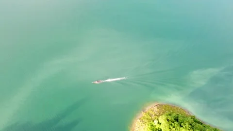 Aerial drone view of long tail boat on the sea. Copy space. Video stock 233163162