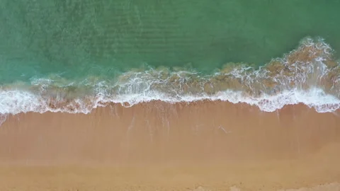 Aerial Drone view looking down on beautiful waves Stock Footage 318043813