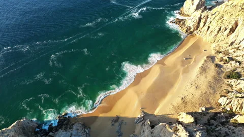 Aerial drone view of Lover's Beach, one of the most famous beaches in Cabo San Stock Footage 321848933