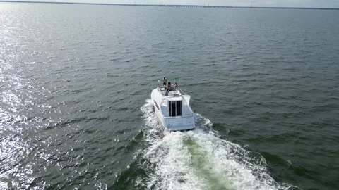 Aerial drone view low over a boat in Tampa Bay FL USA Stock Footage 245934261