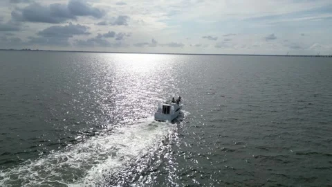 Aerial drone view low over a boat in Tampa Bay FL USA Stock Footage 245934262